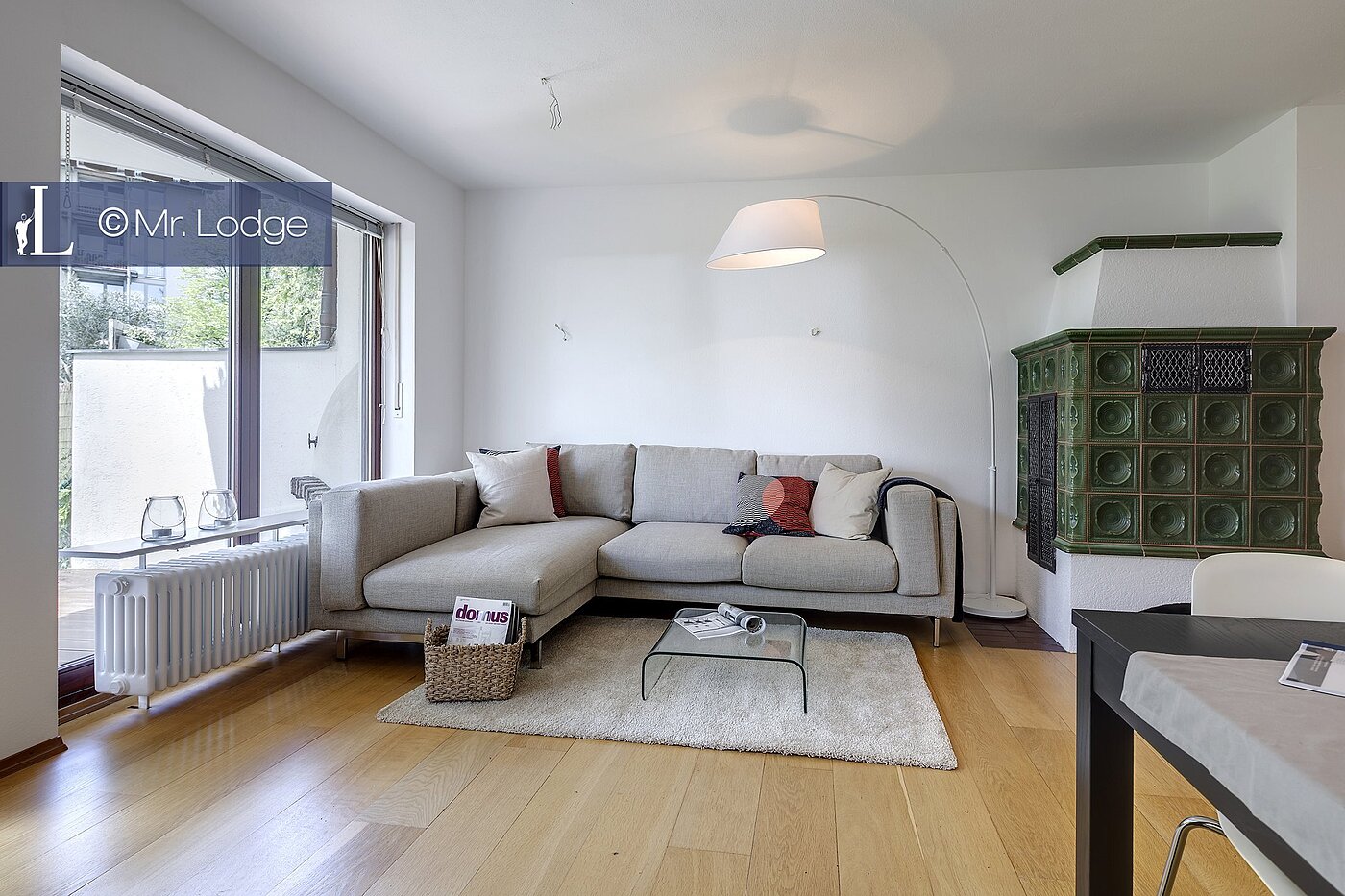 一楼公寓 与 2 房间 | München-Harlaching | 1704ML6 | Wohnzimmer mit Kachelofen