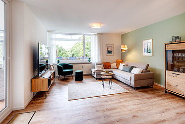 Unterhaching：一处令人心动的现代三居室公寓，配有阳光明媚的南向露台